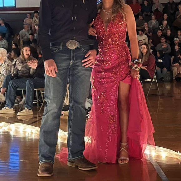 Prom dress for sale. Wore one time for like 3hours. Has a train that ties up.